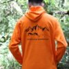 sweat a capuche un pied/un rapprocher